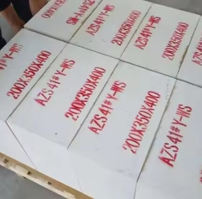Precio de fábrica Fusionado Zirconia Corindón de fundición ladrillo Azs ladrillo refractario para horno de vidrio