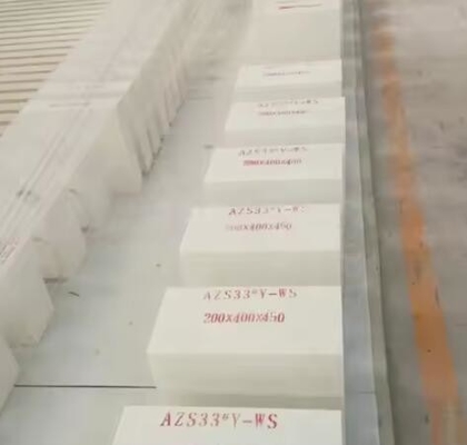 Precio de fábrica Fusionado Zirconia Corindón de fundición ladrillo Azs ladrillo refractario para horno de vidrio